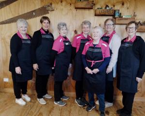 Temuka District Lions Club members acting as waitresses are (from left) Carolyn Keen, Janet...