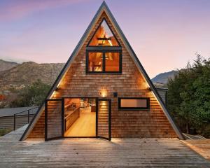 This A-frame house, renovated by Velvin Building, offers modern comforts and gives a nod to...