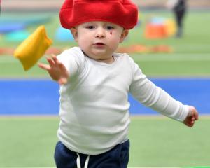 Liam Earnshaw, 2, shows good technique in the shot put competition during yesterday’s mini...