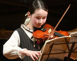 Violinist Annabelle McLenaghen performs a solo in the under-12 category.