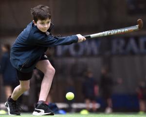 Elijah Henningsen, 12, swings a hockey stick. PHOTOS: PETER MCINTOSH