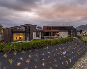 Timber and stone give this Wānaka home a sense of permanence. PHOTOS: JAMIE COBEL