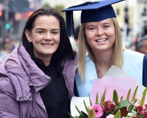 Paralympic athlete Holly Robinson, 29, with friend and bachelor of applied science graduate...