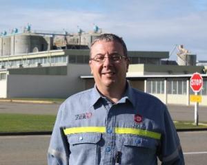 A happy New Zealand Aluminium Smelters chairman Brian Cooper outside the Tiwai Point smelter...