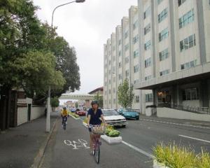 An artist's impression of a one-directional cycle lane in Cumberland St, Dunedin. Image from NZTA.