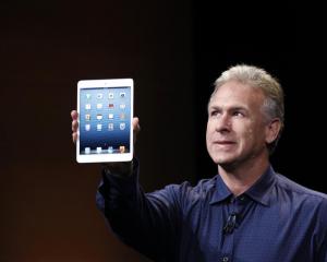 Apple senior vice president of worldwide marketing Philip Schiller introduces the new iPad mini....