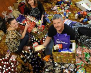 Assembling Christmas hampers for redundant Hillside workers are (from left) Simone Hourigan,...