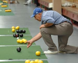 Bob Crawford, of Mosgiel, on his way to the gold medal in the men's 61 and over indoor bowls...