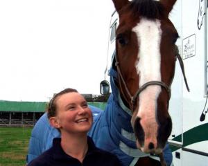 Danielle Simpson and her horse Bartolo prepare for several show-jumping classes at the North...