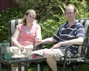 David Bain and fiancee Liz Davies relax in the garden of their Christchurch home. Photo by Herald...