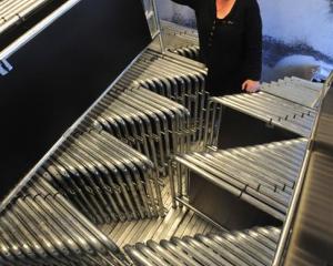 Dunedin City Council events team leader Marilyn Anderson with a batch of new barrier fences which...