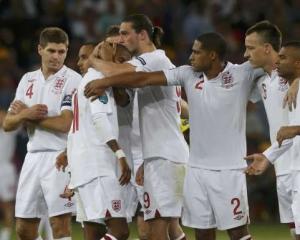 England's players react during the penalty shoot-out.   REUTERS/Eddie Keogh