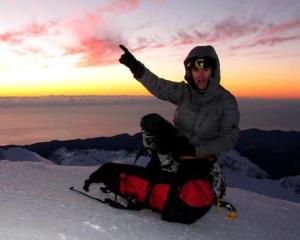 Guy McKinnon on top of Mt Tutoko. Photo supplied.