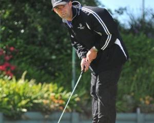Hawkes Bay golfer Robert Robinson demonstrates his skills on the putting green at the Chisholm...