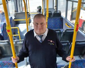 Kelvin McHardy inside the Passenger Transport city bus he will drive during the National Summer...