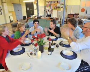 Nathan Mudge (third from left) plays a deaf young man exploring ways of communicating with his...