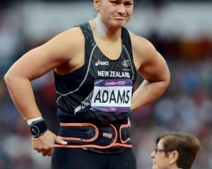 New Zealand's Valerie Adams reacts to winning silver in the women's shot put final at the Olympic...