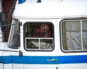 New Zealander Jonathan Beauchamp leaves the Leninsky District Court of Murmansk, after being...