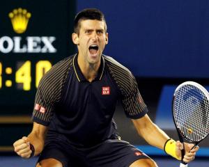 Novak Djokovic of Serbia celebrates defeating Andy Murray of Britain in their men's singles final...