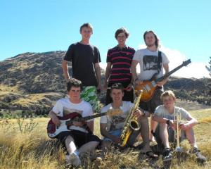 Queenstown band Dubside will open the  Gibbston Valley Winery concert on Saturday. From back left...