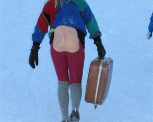 Queenstown's Kelly Zontine,  alias"Buns of Steel", scales the slopes with her conveyance during...