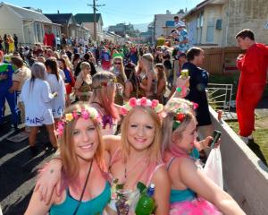 Revellers into the swing of things early at the Hyde St Keg Party in Dunedin today. Photo Gerard...