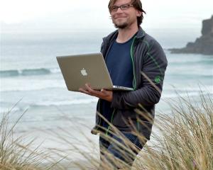 Sea lion researcher Stefan Meyer at Tomahawk Beach. Photo by Peter McIntosh.