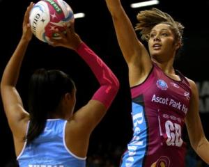 Southern Steel goal defence Phoenix Karaka (right) tries to block a shot by Northern Mystics goal...