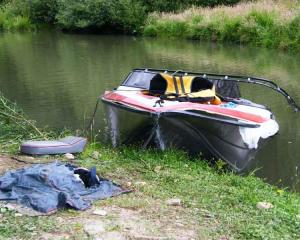 The damaged private jet boat, occupied by three men on a fishing trip, was photographed by...