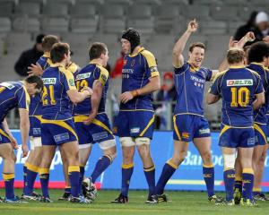 The Otago team celebrates after beating Auckland 32-25 last night.