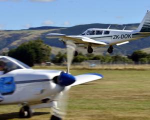 The Piper is seen just before landing.