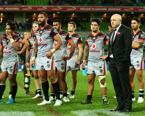 A dejected Andrew McFadden with his team after the match. Photo Getty