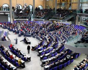 Members of the Bundestag, German lower house of Parliament, are seen during a session of the...