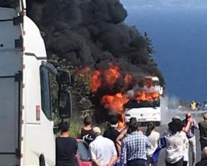 The bus was fully engulfed in flames. Photo: Laura Smith