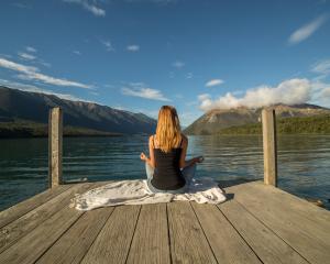 Only some meditations involve sitting quietly with legs crossed. Photo: Getty Images