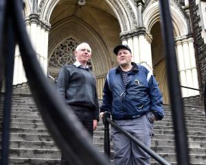 Catholic Bishop of Dunedin the Most Rev Michael Dooley (left) is lending financial support to...