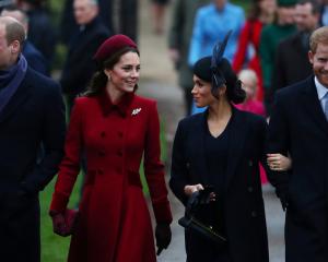 Prince William, Duke of Cambridge and Catherine, Duchess of Cambridge along with Prince Harry,...