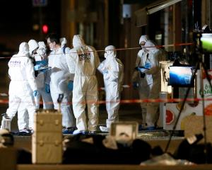 French police were hunting a suspected suitcase bomber on Friday after an explosion in the...