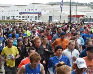 Runners head off from the starting line at the Cadbury Dunedin Half marathon. Photo by Gregor...