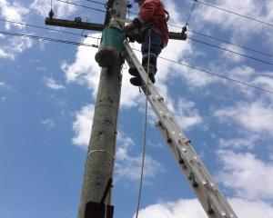 Evaluating the local network prior to the deployment of the Blueskin Energy Network. Photos:...