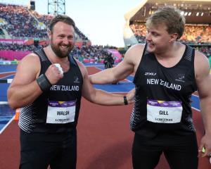 Tom Walsh (L) and Jacko Gill celebrate their one-two finish in the men's shot put final. Photo:...