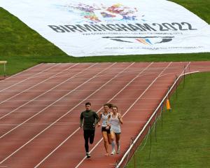 Athletes train at the Alexander Athletics Stadium after Birmingham was awarded the Commonwealth...