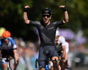 Aaron Gate celebrates winning gold in the men's road race on Sunday. Photo: Getty Images 
