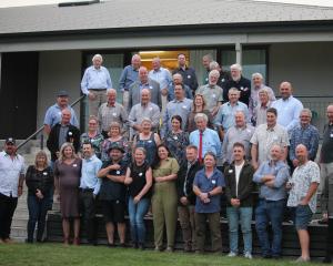 Standing outside the Lake Hawea Community Centre, past and present members of the Lake Hawea...