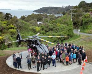 Emergency personal and members of the community gather during the official opening of a rescue...