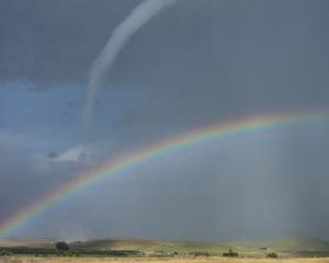 The tornado above a rainbow. Photo: CONNOR DIVER