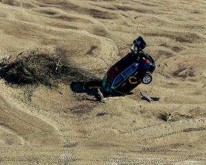 A car stuck in  river silt in the aftermath of Cyclone Gabrielle in the Esk Valley near Napier....