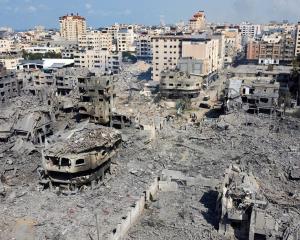 Buildings destroyed by recent Israeli strikes in Gaza City. Photo: Reuters