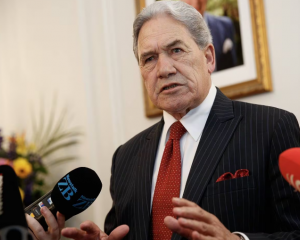 Deputy Prime Minister Winston Peters talking to journalists after the swearing-in ceremony at...