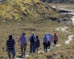 Walkers explore the Bannockburn Sluicings on a summer’s day. PHOTO: JENNY CHRISTENSEN